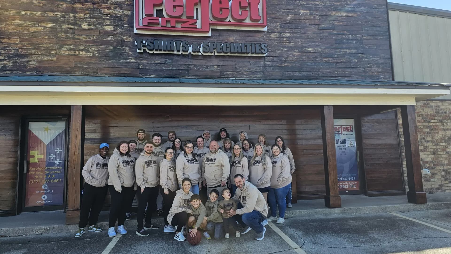 The Perfect Fitz T-Shirts & Specialties team outside their Broussard LA facility