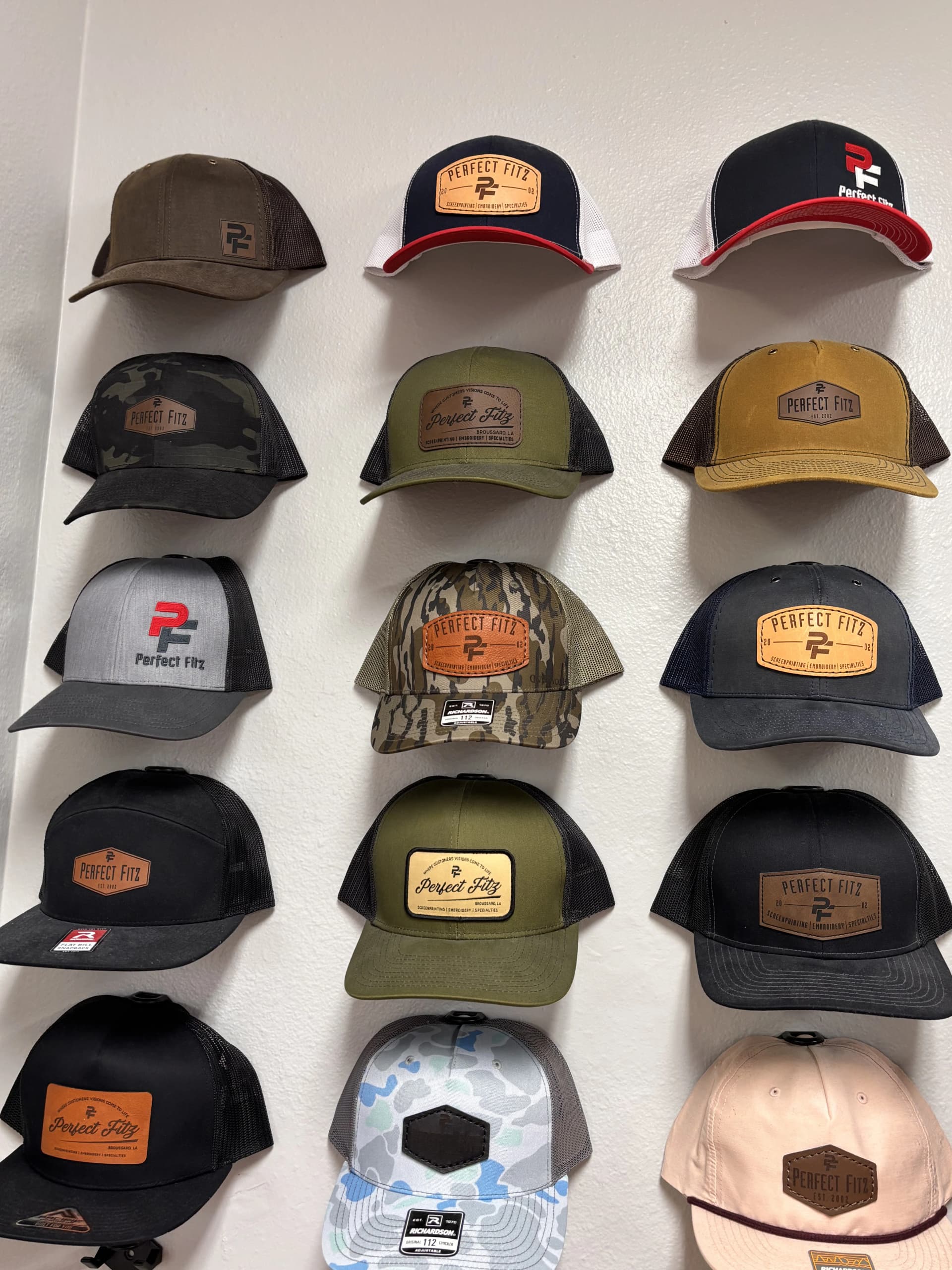 Collection of custom patch hats by Perfect Fitz T-Shirts & Specialties