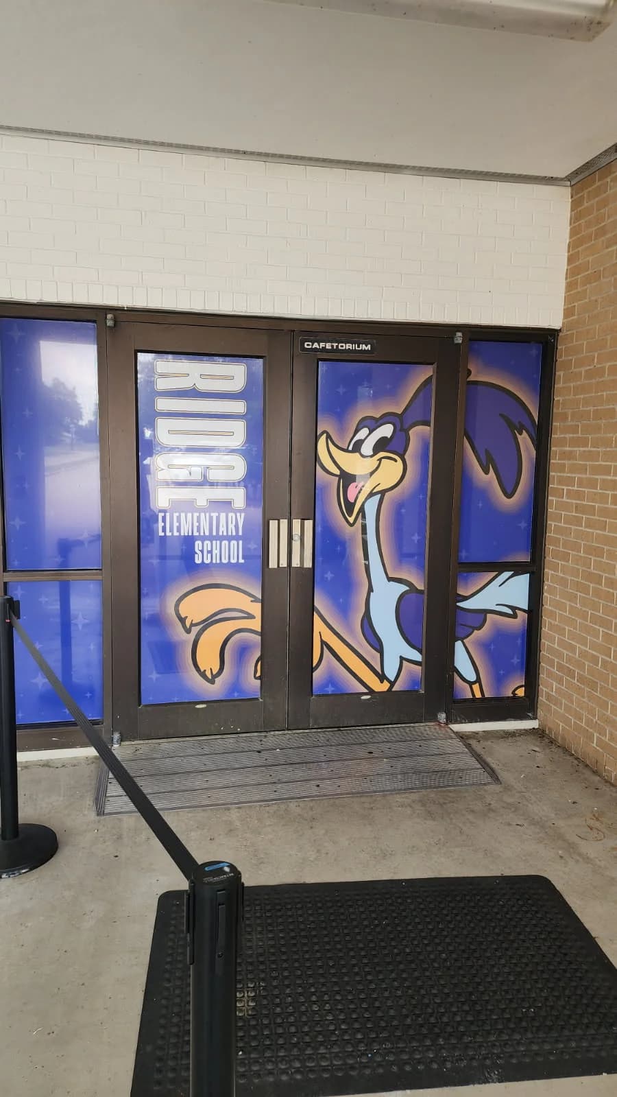 Ridge Elementary School entrance doors with full-color vinyl wrap by Perfect Fitz